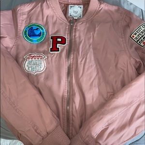 Pink patched bomber jacket